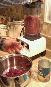 blending homemade cranberry sauce