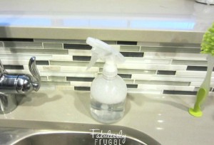 spray bottle with soap water with logo