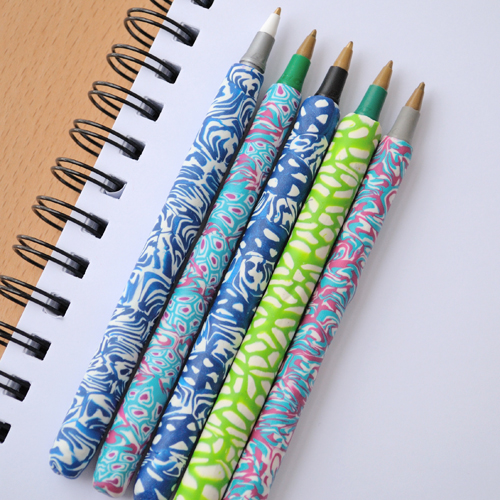 POLYMER CLAY COVERED PENS.