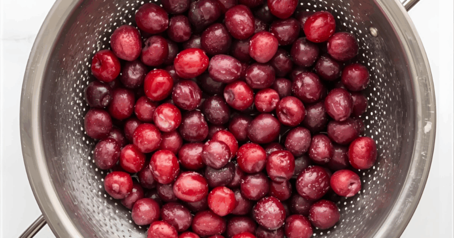 freshly washed cranberries in a colander