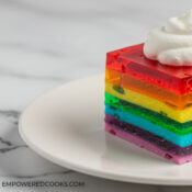 yogurt rainbow jello with whipped cream on top