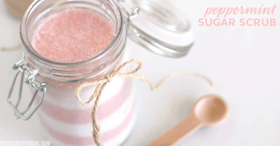 Jar filled with layered candy cane sugar scrub