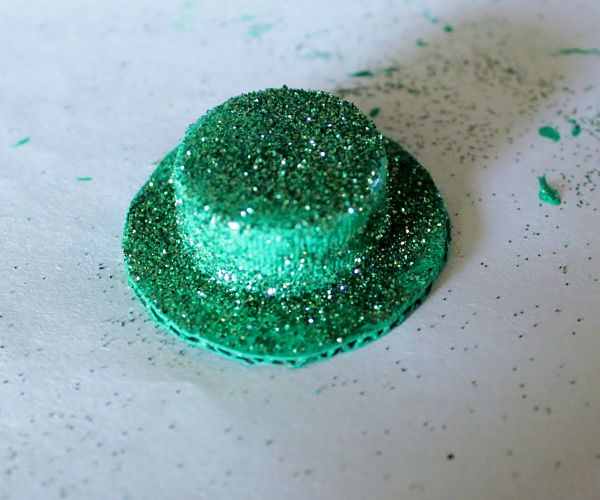 Green glittery mini hat