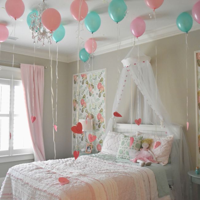 Balloons above bed Valentine's Day idea