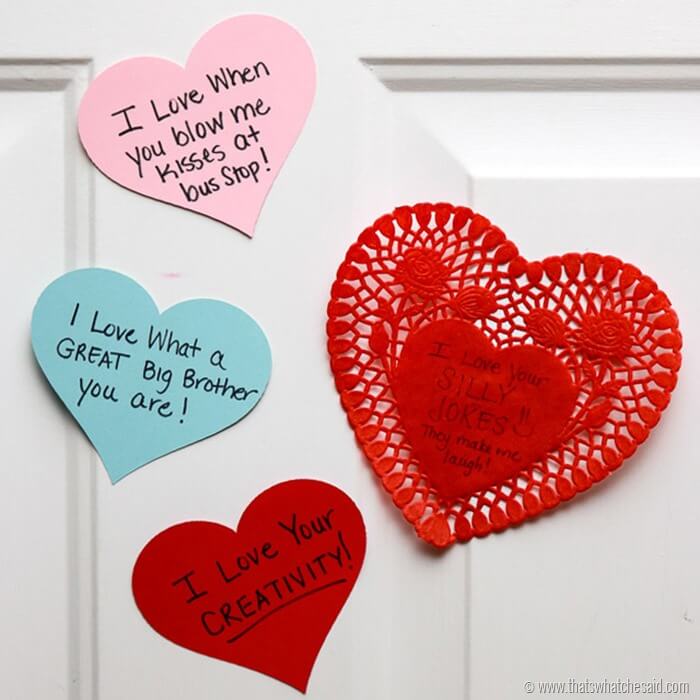 Construction paper hearts on a door for Valentine's Day