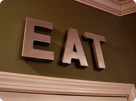 Hung up faux metal letters