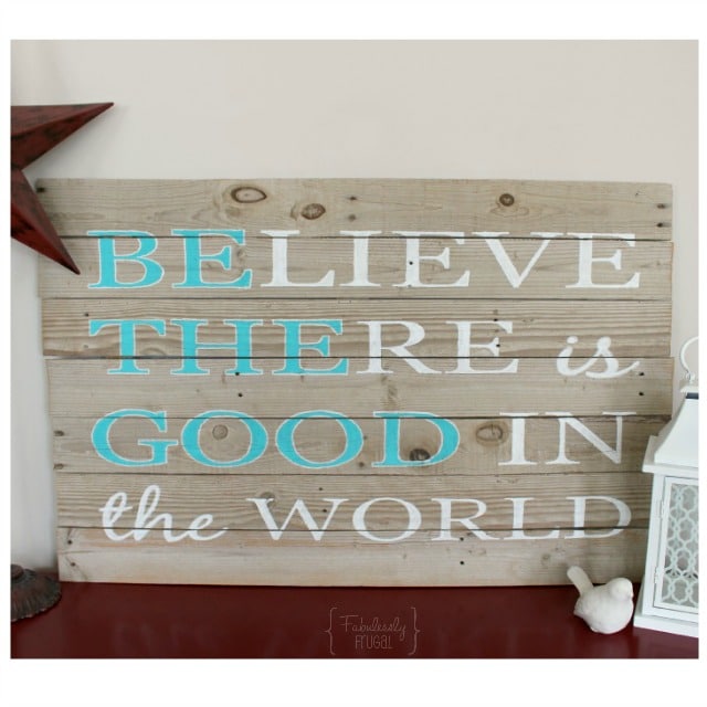 Painted believe there is good in the world sign