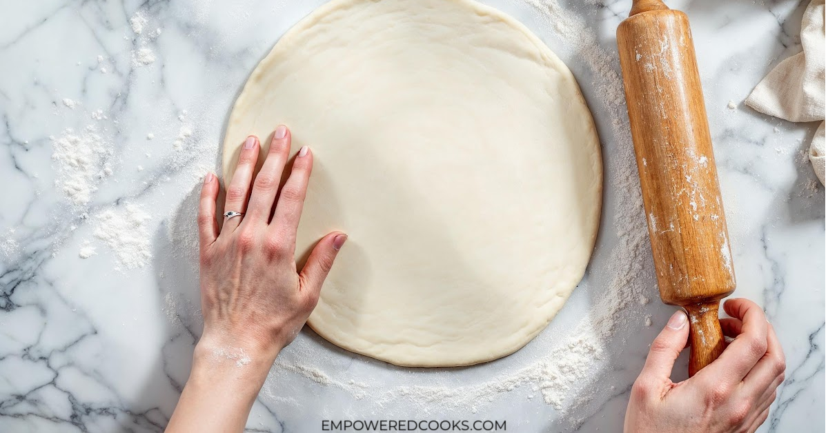 rolling out biscuit dough