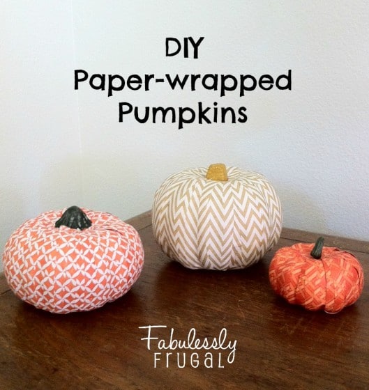 three paper wrapped pumpkins