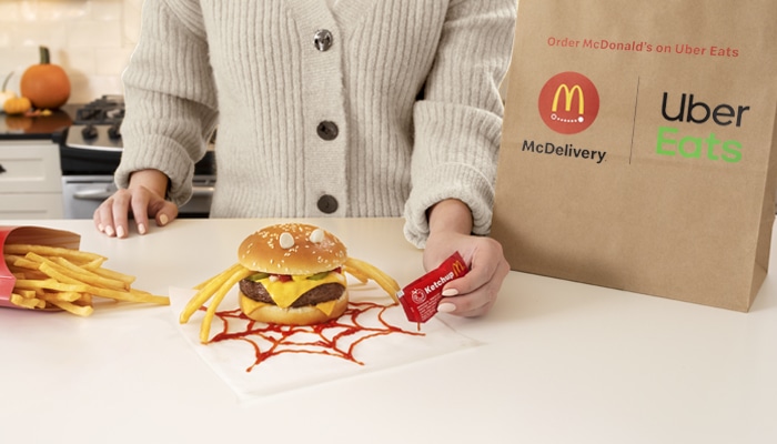 McDonalds Halloween themed burger with Uber Eats bag