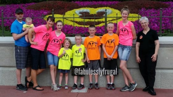 Cathy and her family at Disneyland