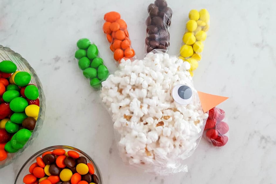 Turkey shaped bag filled with popcorn and candies