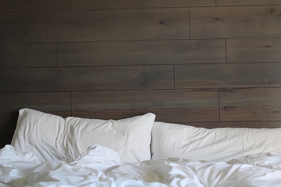 Bed made with wood headboard