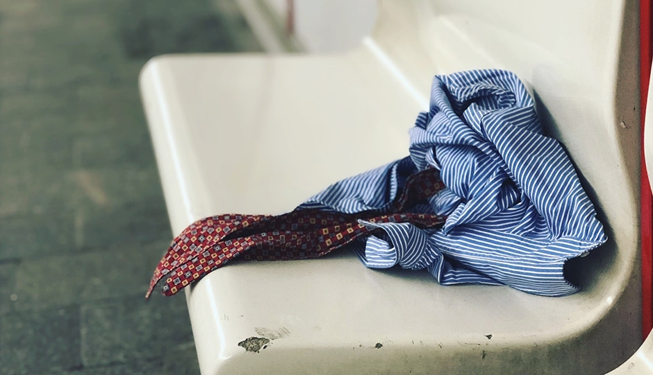 Shirt and tie sitting on a bench