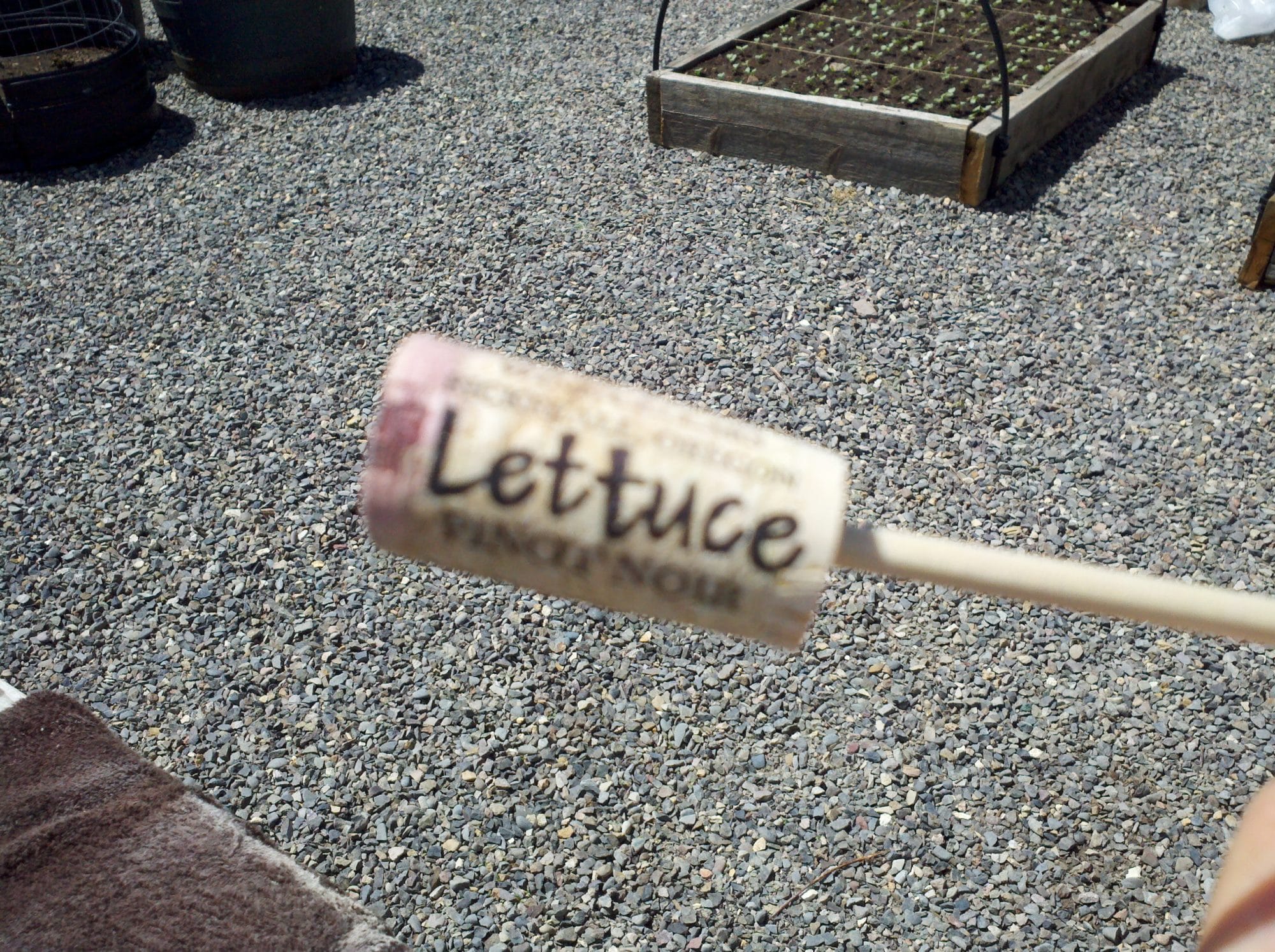 The word lettuce written on a cork