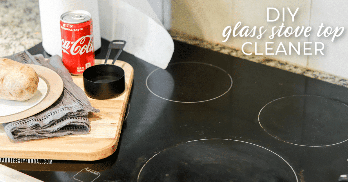 Glass stove top with hard water stains and grime