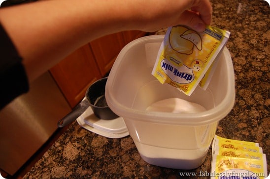 Adding more ingredients to the homemade dishwasher soap