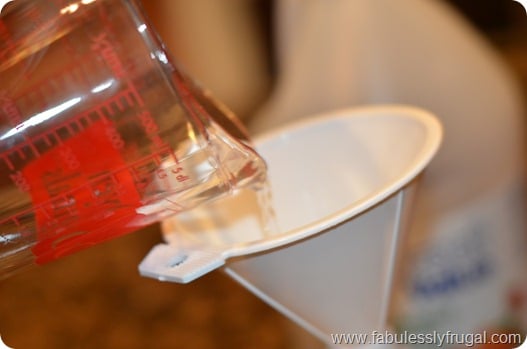 Adding vinegar and rubbing alcohol to homemade glass cleaner