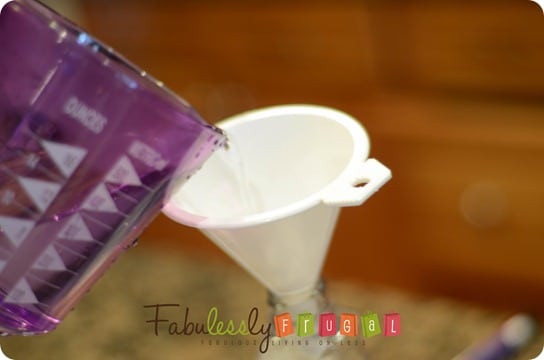 Adding water to the homemade all purpose cleaner