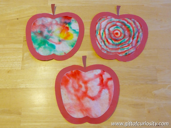 Three crazy colored apples