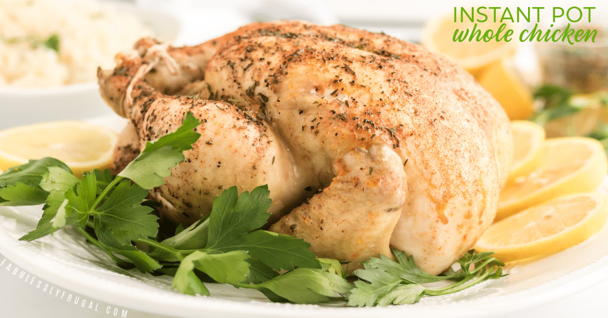Cooked whole chicken with seasoning and lemon