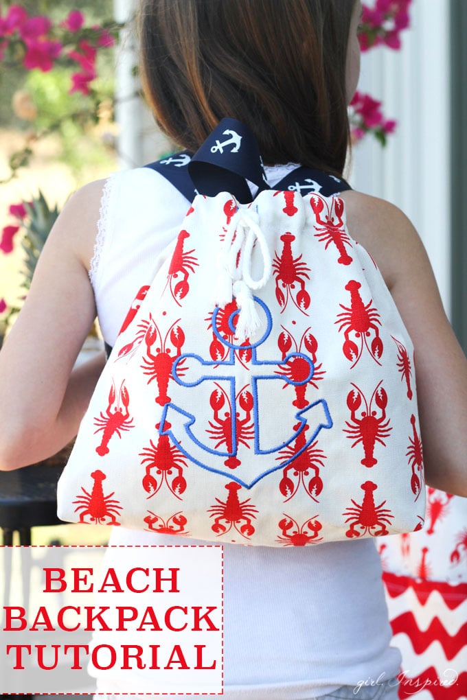 Girl wearing beach themed backpack with anchor stitching on it