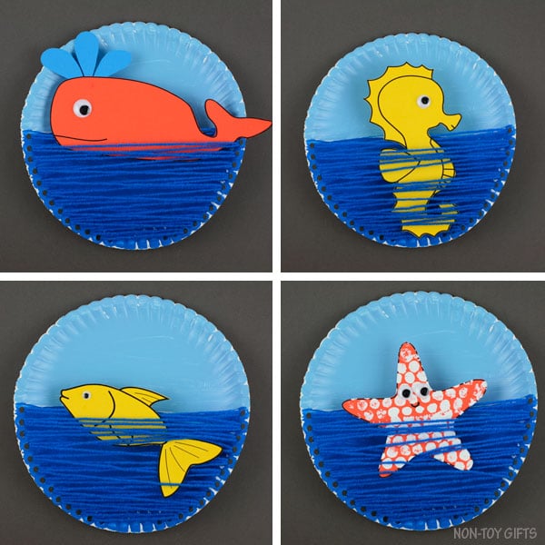 Whale, seahorse, fish, and starfish paper plates