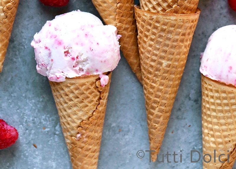Waffle cones of raspberry ripple ice cream