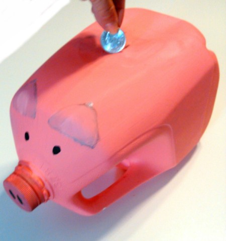 Pink milk jug piggy bank