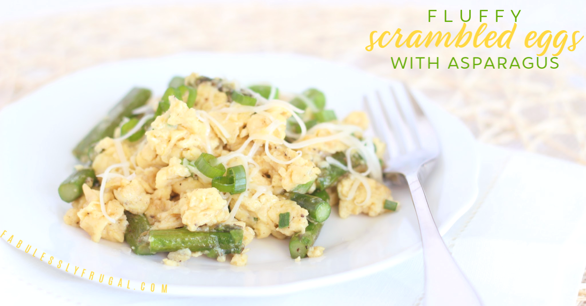 Plate of scrambled eggs with asparagus