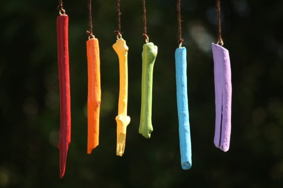 Hanging sticks painted like a rainbow