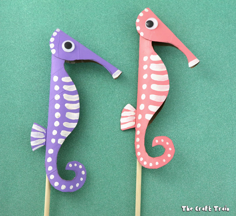 Purple and pink seahorse puppets