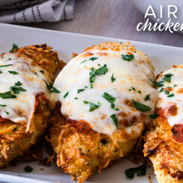 Your next go-to family meal is this beautiful, crunchy, and flavor-packed chicken parmesan made right in your air fryer!