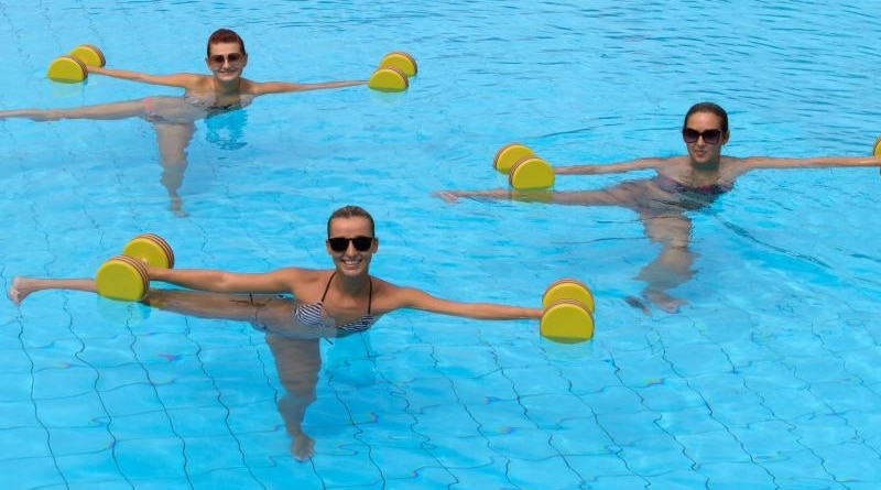 people working out in a swimming pool