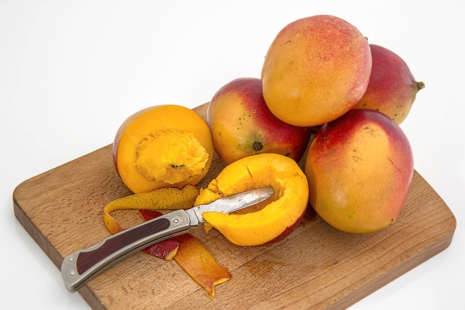 Mangos on cutting board