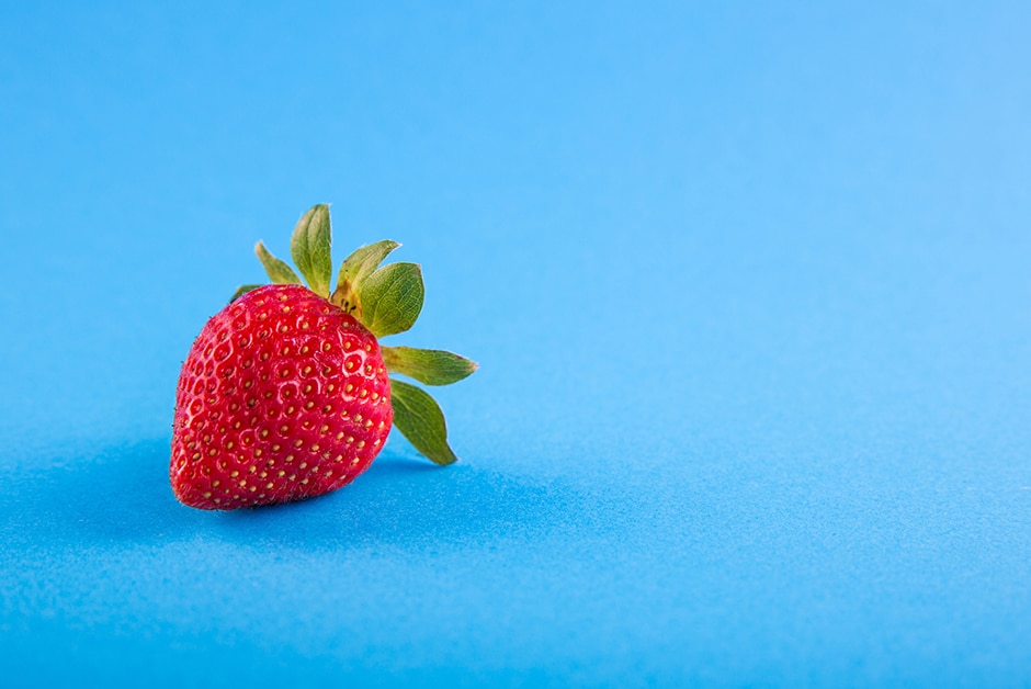 Strawberry on blue background