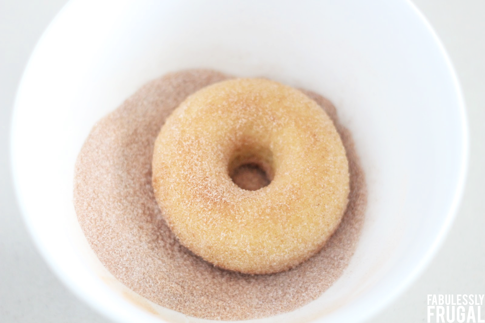 coat keto donuts in cinnamon and erythritol