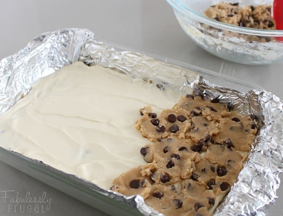 layer cookie dough and cheesecake for chocolate chip cheesecake cookie bars
