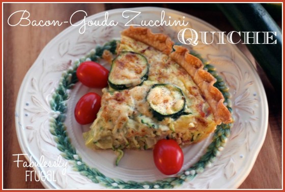 Bacon gouda quiche on a plate with text over the image