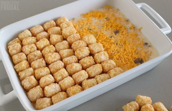 baked cheesy tater tot breakfast casserole with sausage and eggs