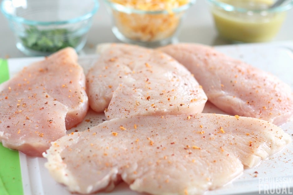 seasoning the chicken breasts