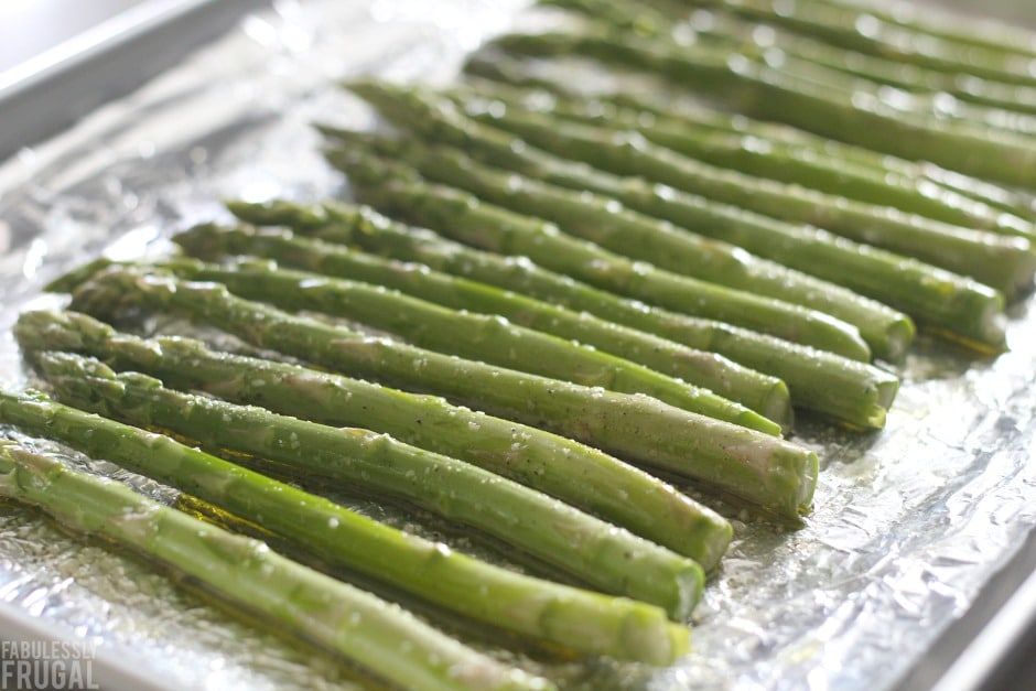 seasoned asparagus ready for roasting