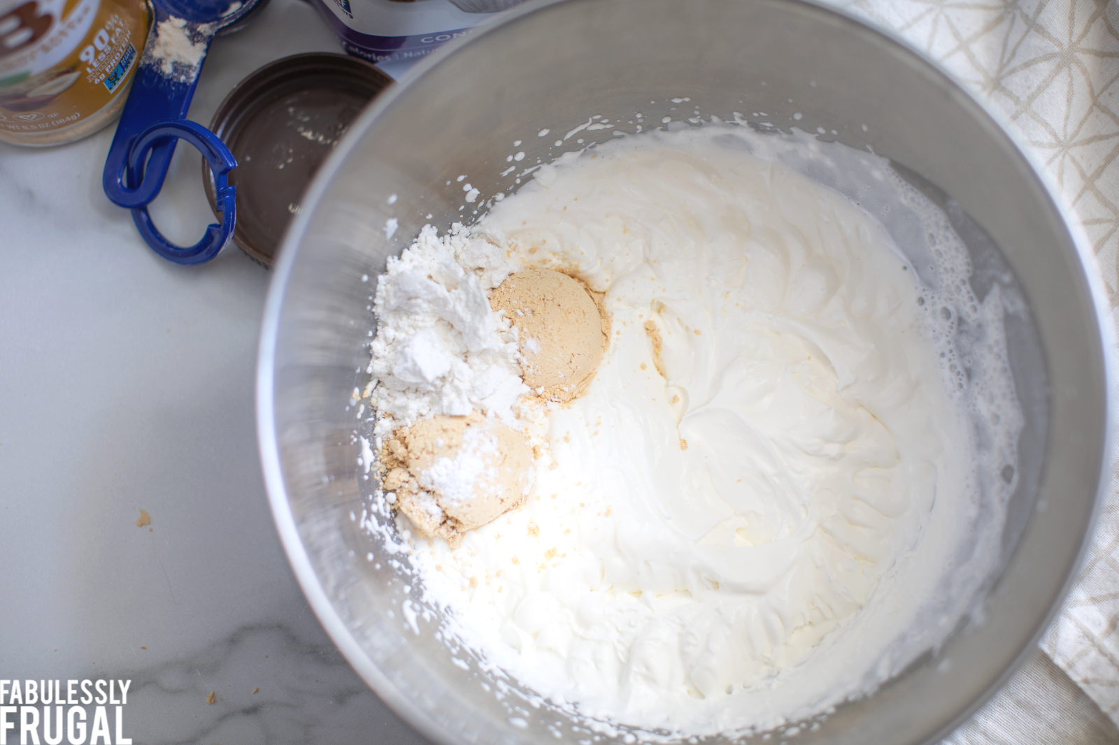 Ingredients for peanut butter topping in mixing bowl