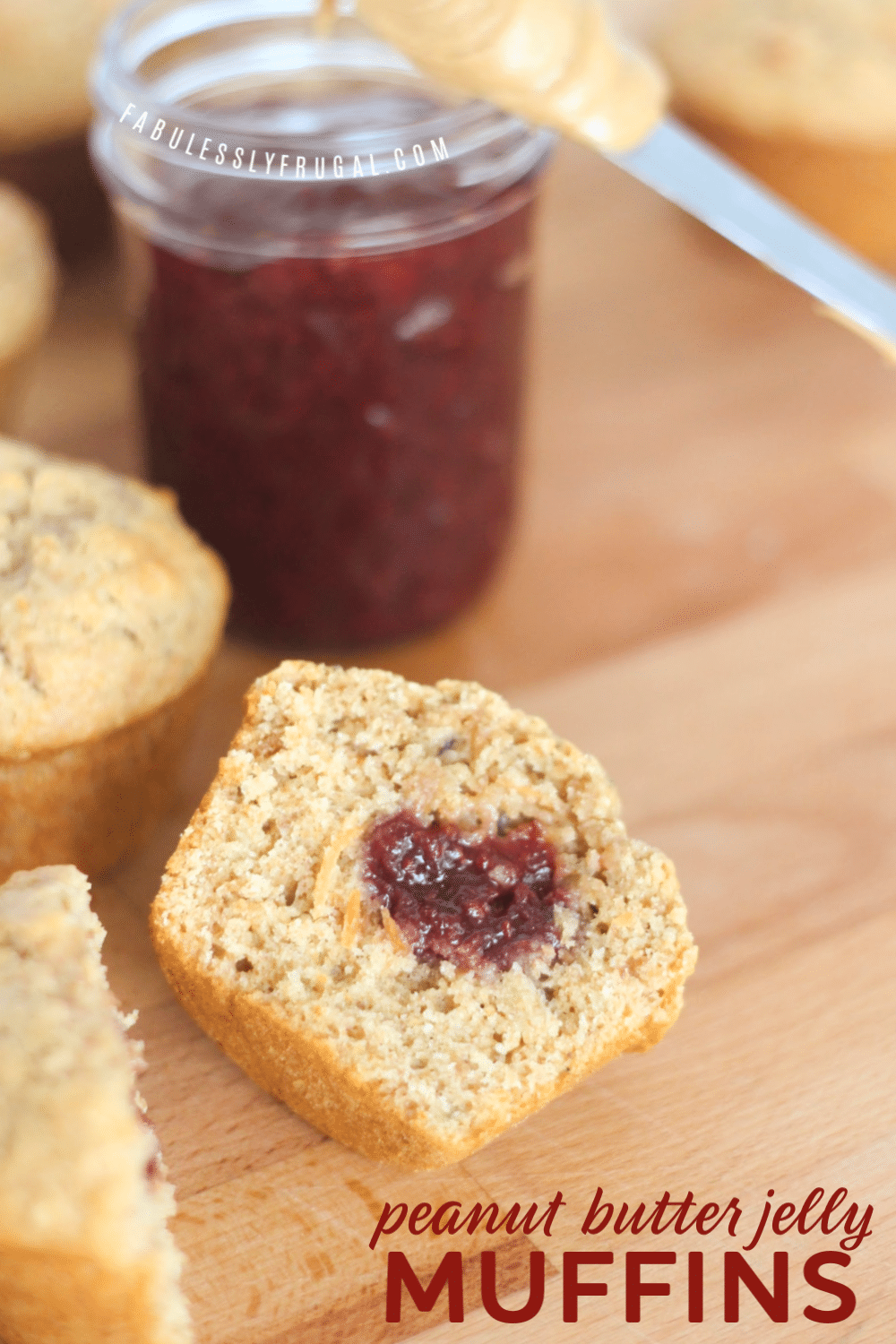 Peanut butter and jam muffins on a cutting board