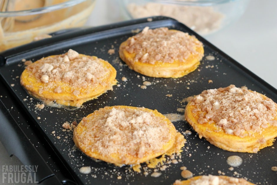 Pumpkin streusel pancakes on the griddle