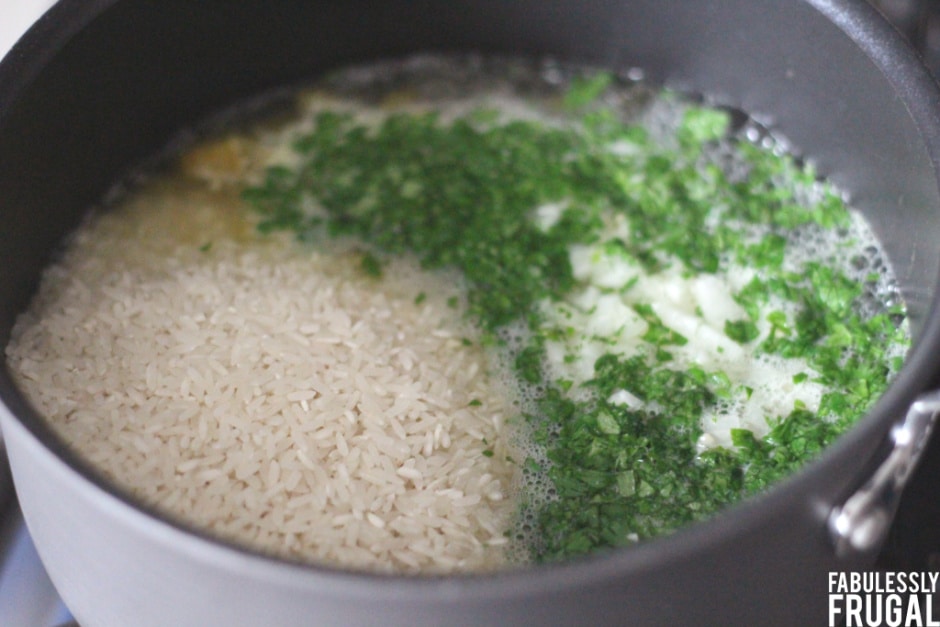 Rice and ingredients in pot 