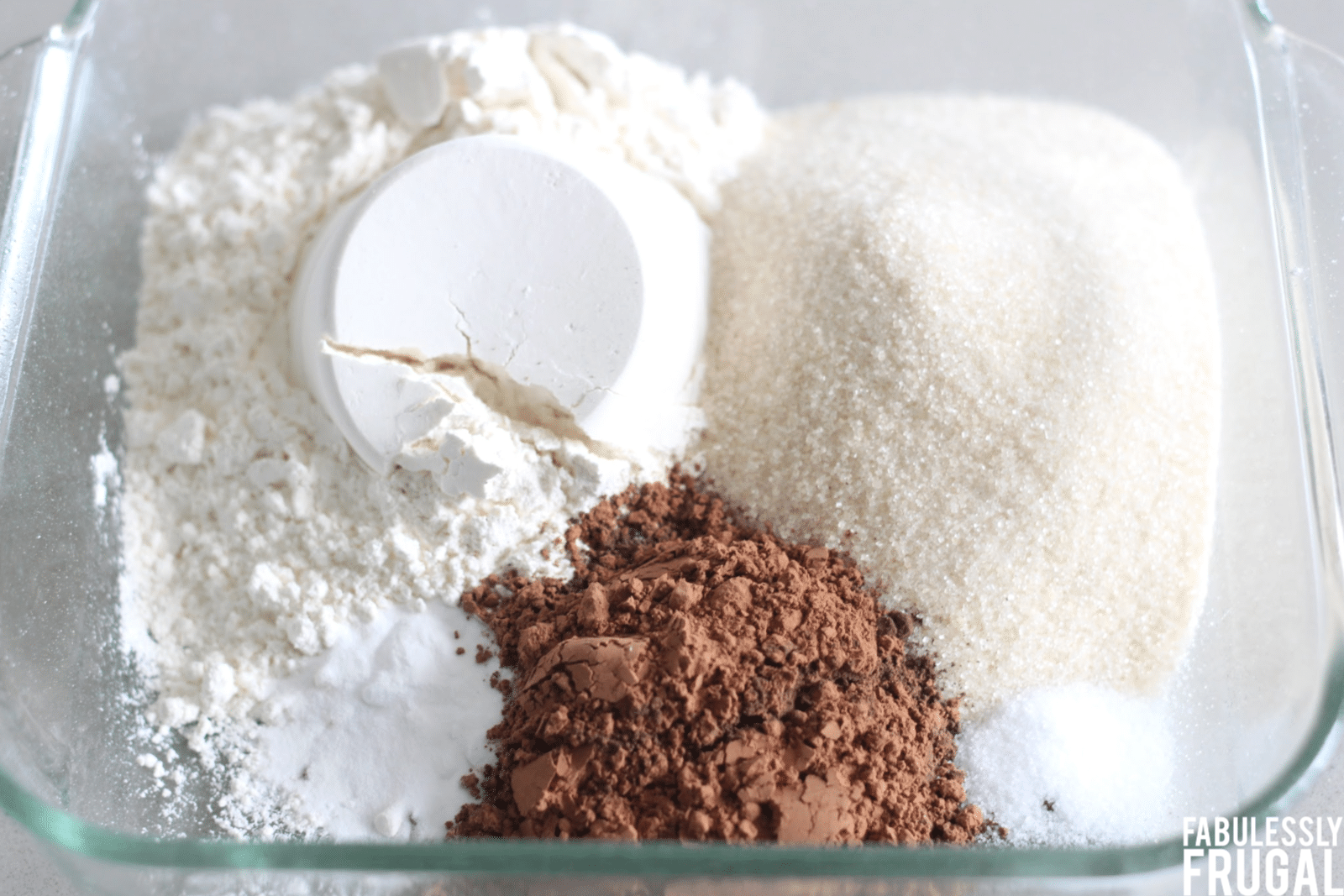  flour, sugar, cocoa, salt, and baking soda in cake pan