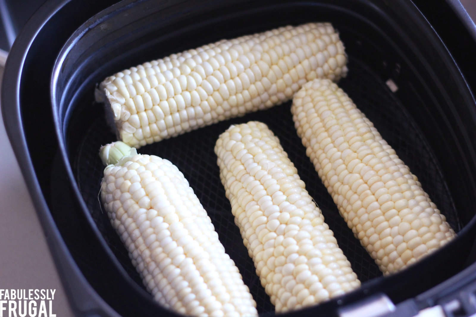 Uncooked corn on the cob in air fryer