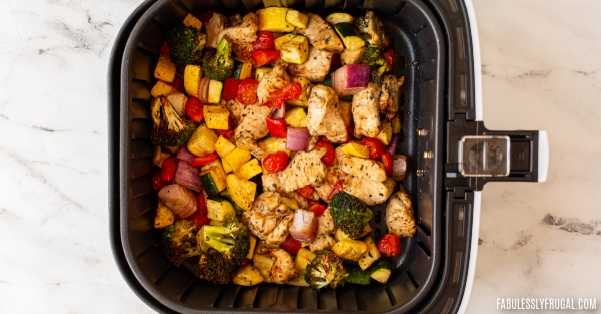 https://fabulesslyfrugal.com/wp-content/uploads/2022/01/air-fryer-balsamic-chicken-and-veggies-6.png