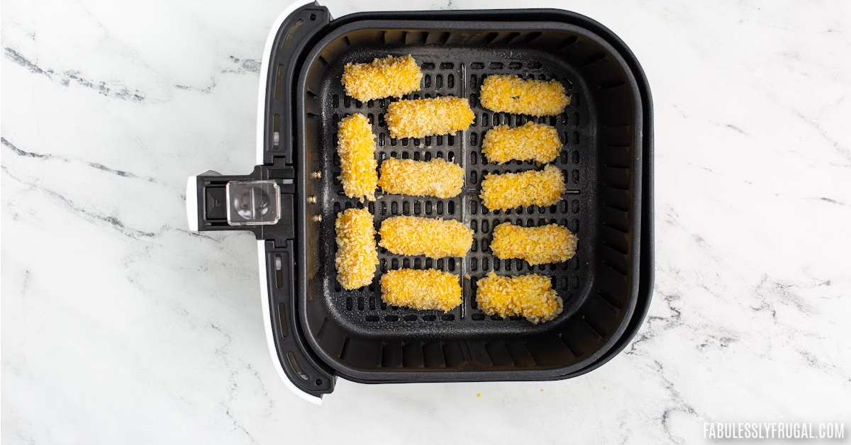 place the cheese sticks in the air fryer basket
